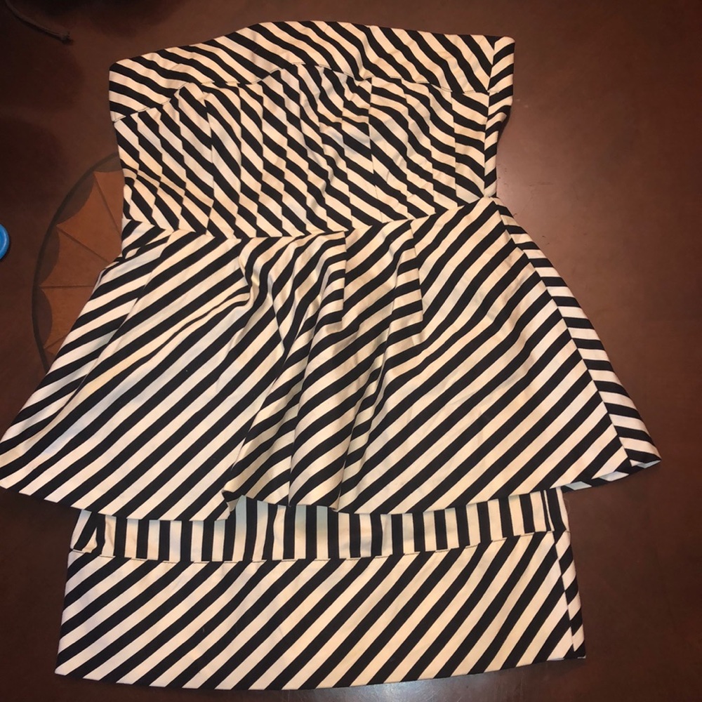 A black and cream stripped tight fitted dress